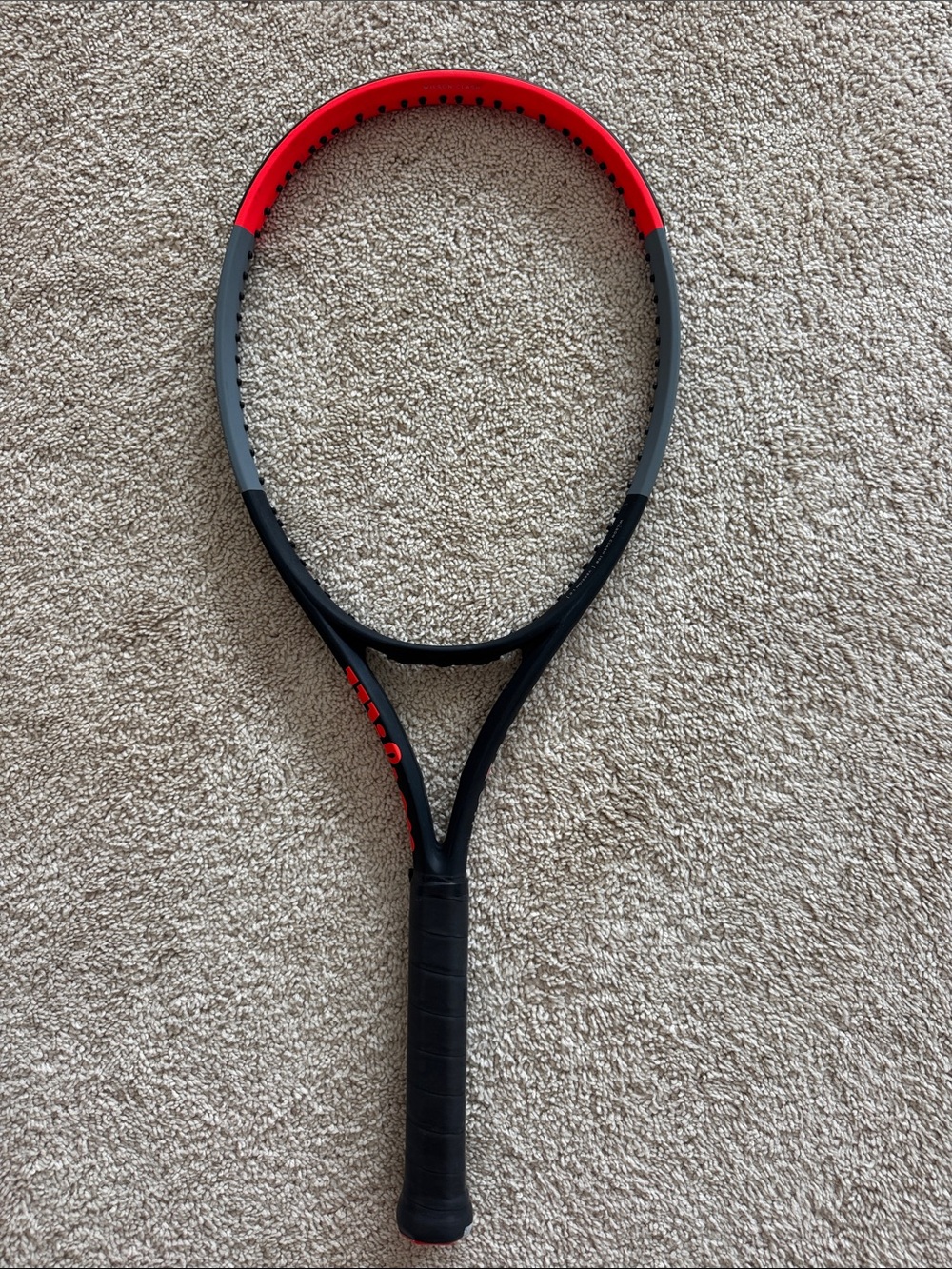 Wilson Black and Red Tennis Racket - Lightweight Performance Frame
